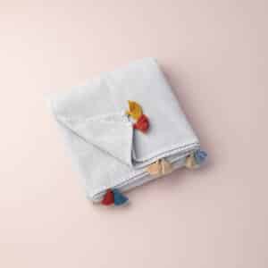 serviette plage gris pompons tichka