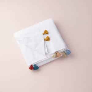 serviette plage blanche pompons tichka